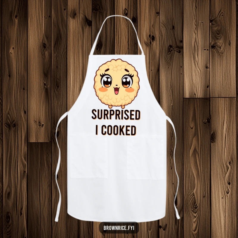 Funny apron depicting a brown rice grain character with comically wide eyes, showing a humorous state of shock.