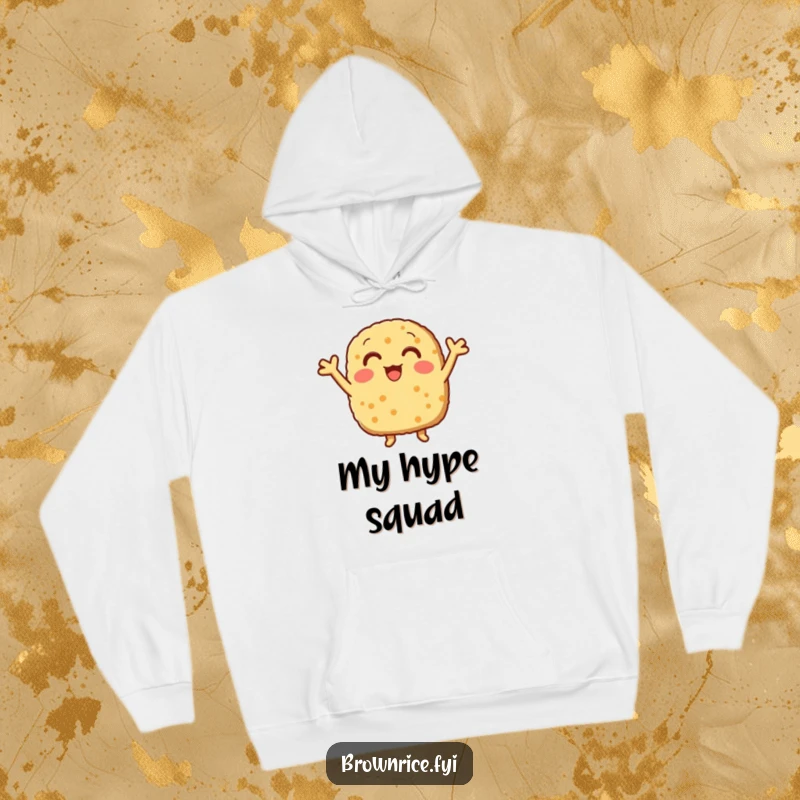 Funny brown rice patty with little arms cheering energetically, featured on a soft and warm hoodie.