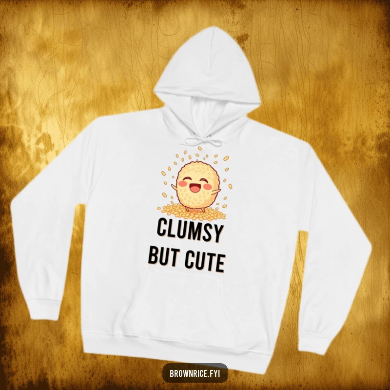 Funny Hoodie featuring a laughing brown rice character tripping and scattering grains in a playful explosion.