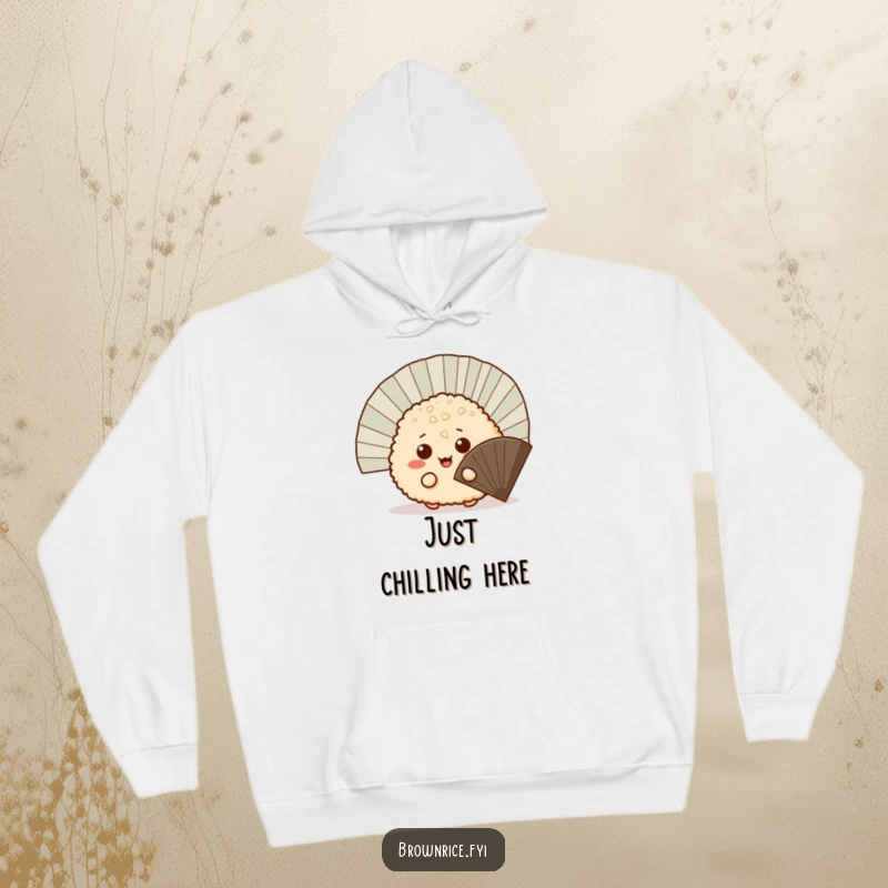 Funny mischievous brown rice ball peeking out from behind a fan, a warm hoodie featuring a cute and playful cartoon character.