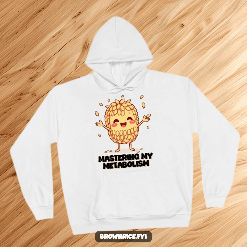 Funny hoodie showcasing a happy brown rice grain character expertly juggling smaller grains, a symbol of playful control.