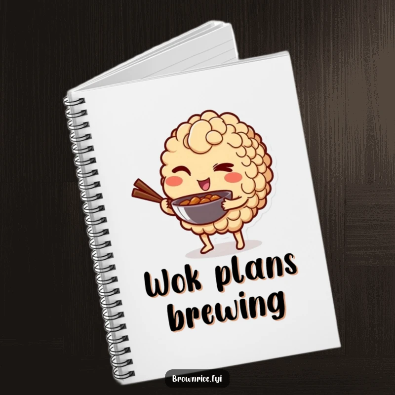 Funny notebook with a brown rice grain character winking playfully while holding a mini wok, perfect for playful notes.
