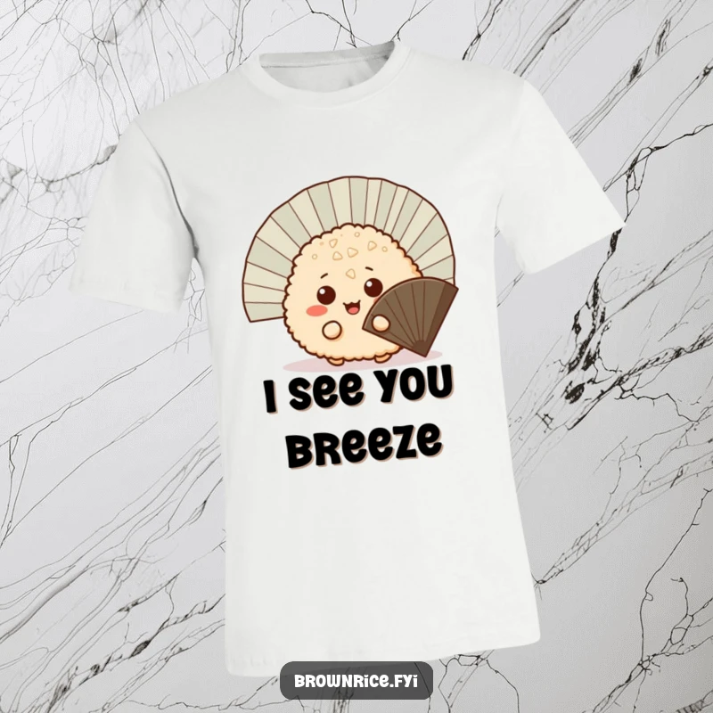 Funny mischievous brown rice ball peeking out from behind a fan, a cute cartoon printed on a comfortable t-shirt.