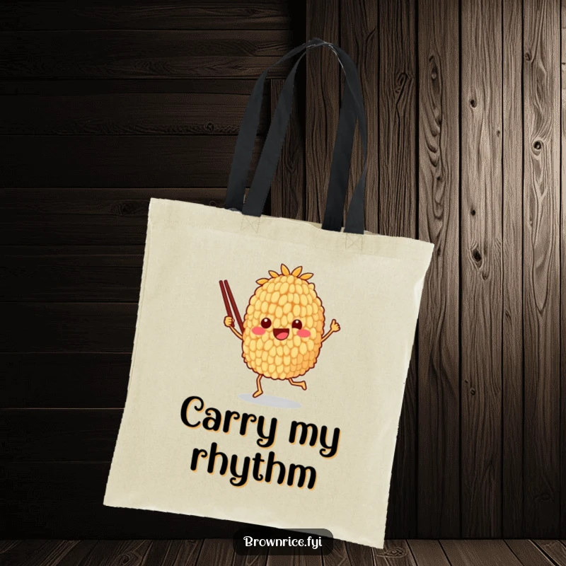 Funny tote bag showcasing a brown rice grain character joyfully dancing with chopsticks, perfect for carrying groceries with humor.